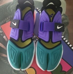 Multi color Nike Aqua Rift ..... In original box... Gently Worn... womens sz. 11